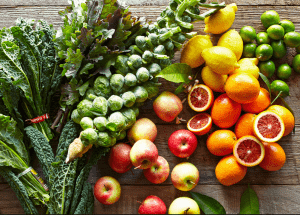 a group of fruits and vegetables on a wood surface Healthy Weight Loss Diets Barr Common